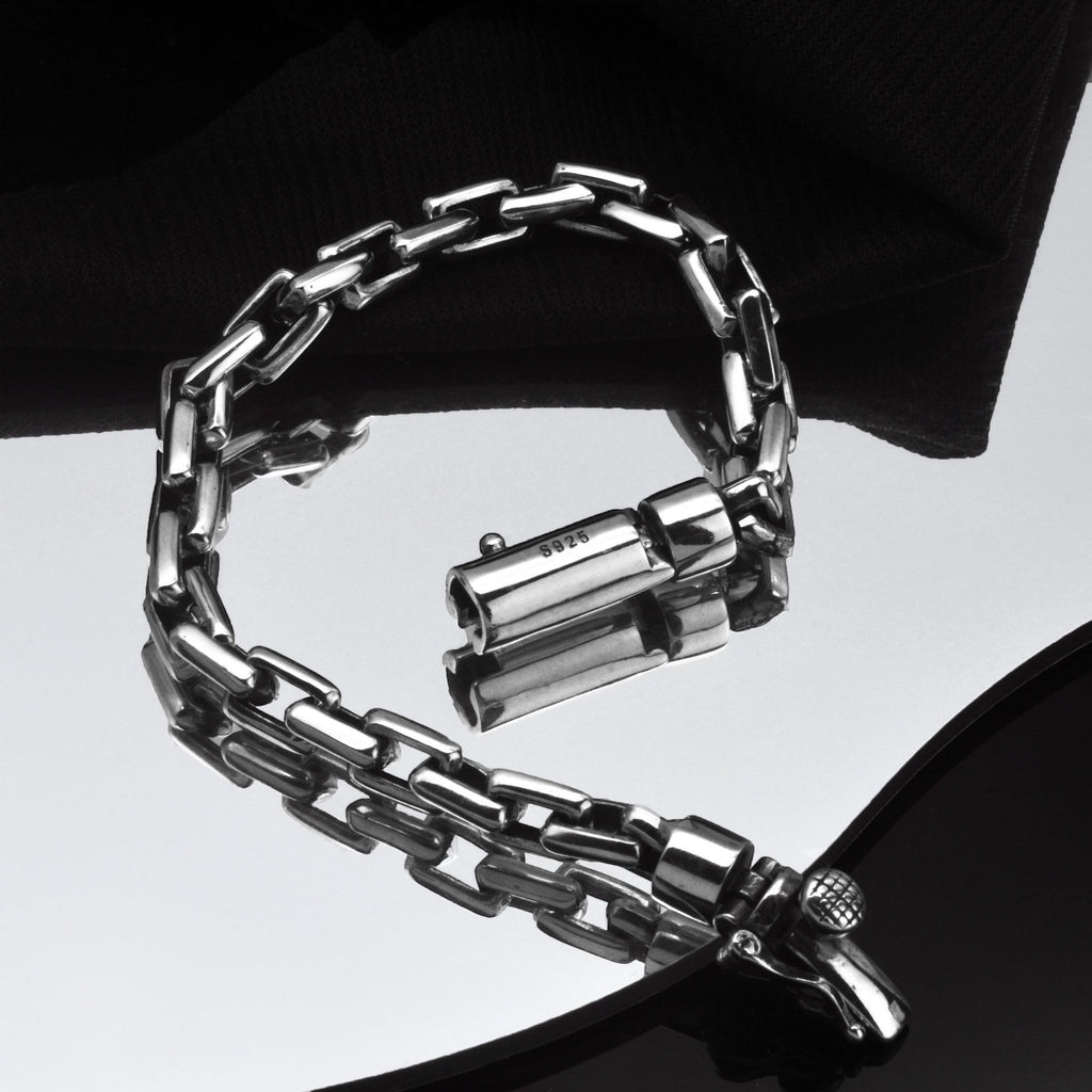 BoxUnboxed Kinetic Box Chain bracelet in solid 925 sterling silver with a heavy-duty utility safety clasp and oxidized industrial accents.