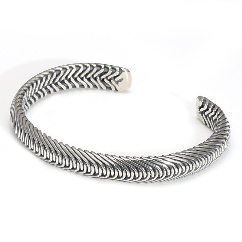 BoxUnboxed Nordic Frost Artisan Braided Silver Cuff. Solid 925 sterling silver, 35g, open cuff style with intricate braided texture and polished borders.