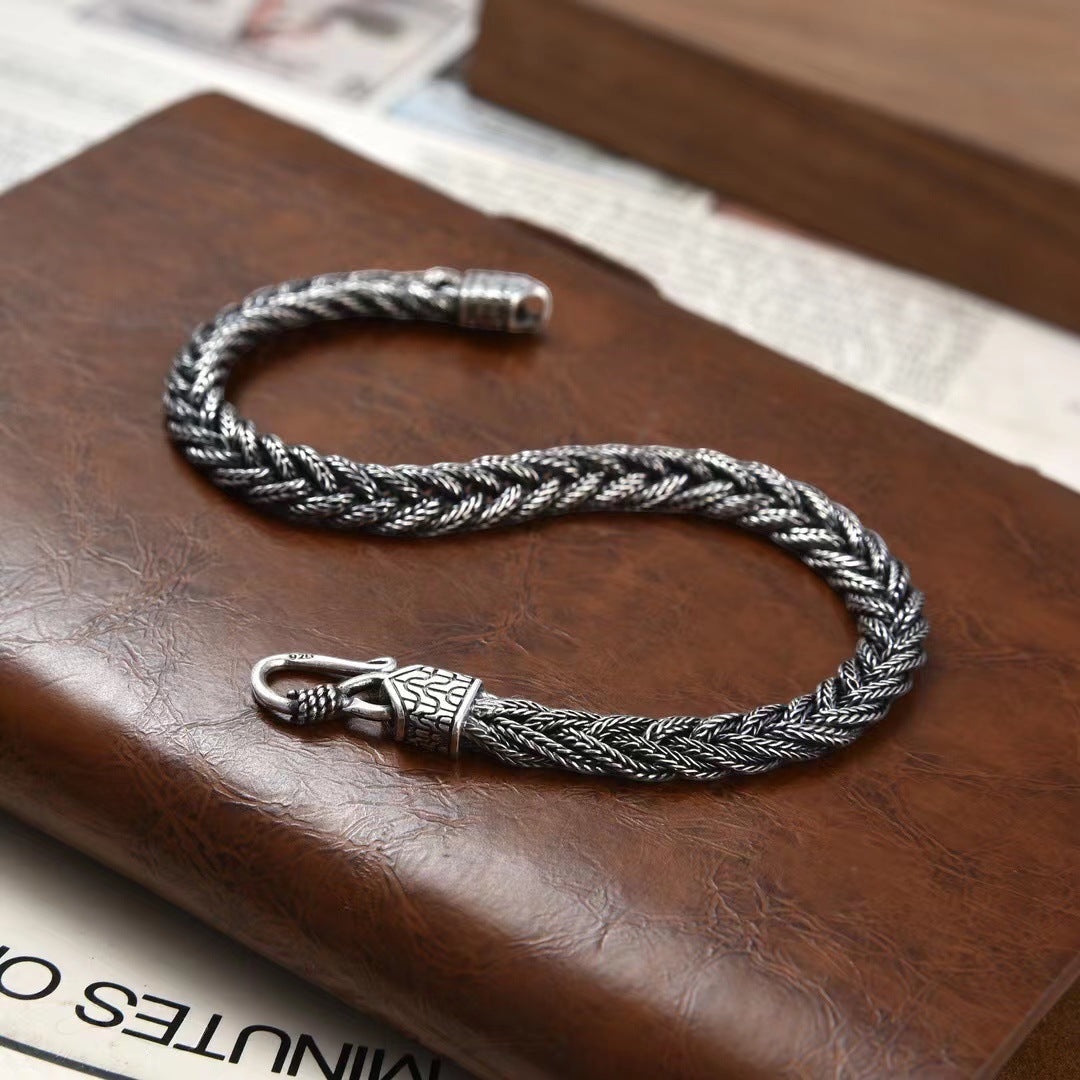 BoxUnboxed Sovereign Viking Vajra braided link chain bracelet in solid 925 silver with oxidized patina and hook clasp.