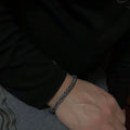 BoxUnboxed Sovereign Viking Vajra braided link chain bracelet in solid 925 silver with oxidized patina and hook clasp.