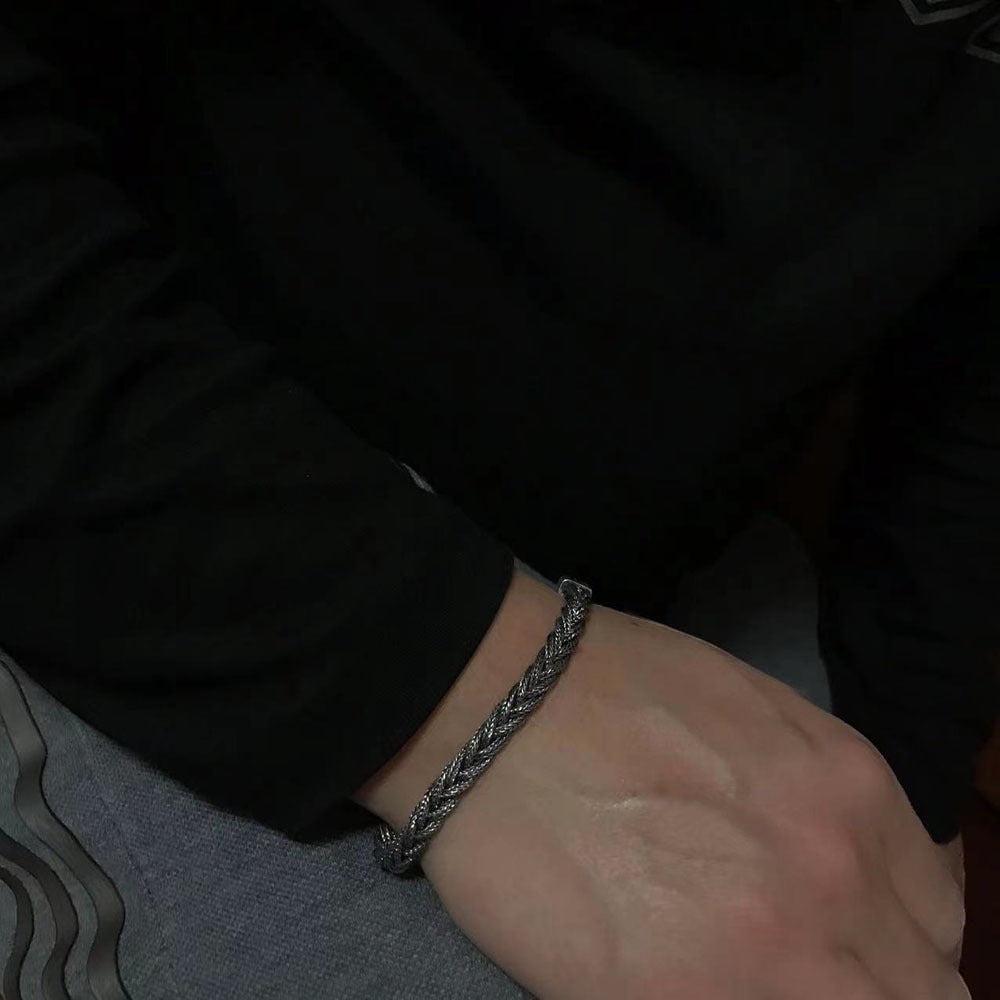 BoxUnboxed Sovereign Viking Vajra braided link chain bracelet in solid 925 silver with oxidized patina and hook clasp.