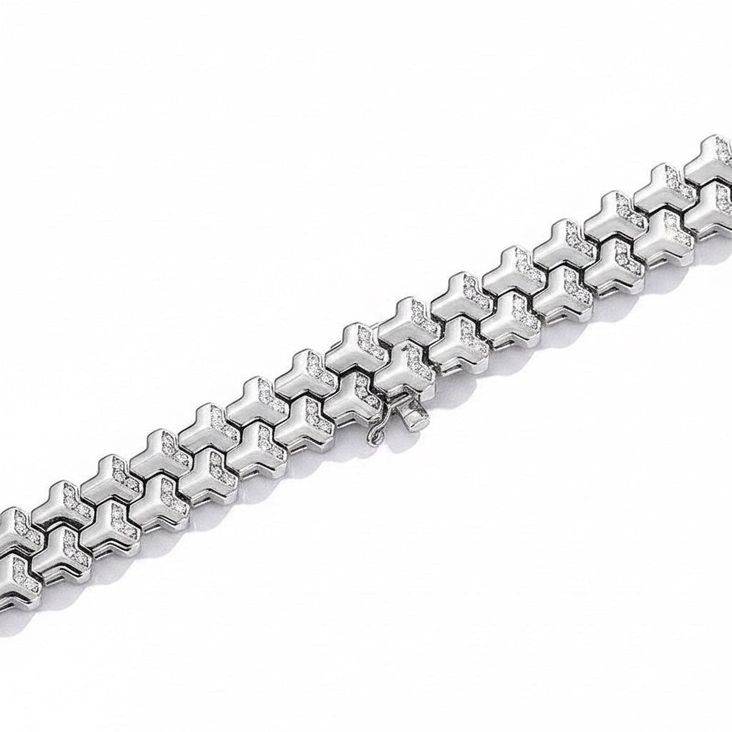 BoxUnboxed sterling silver interlocking moissanite chain link bracelet with propeller design and platinum rhodium plating.